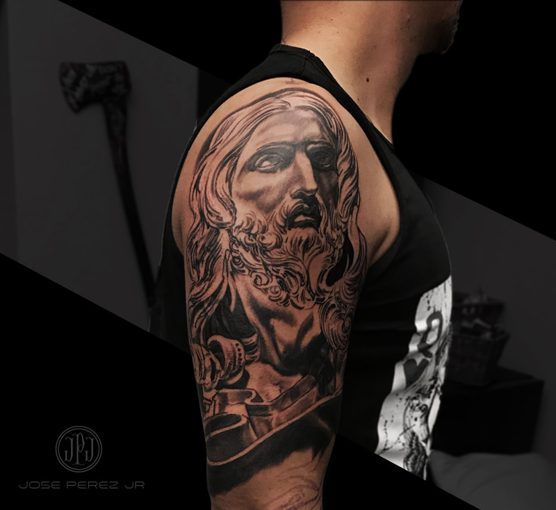 Jesus Statue Shoulder Tattoo Focus Image/Social Media Graphic